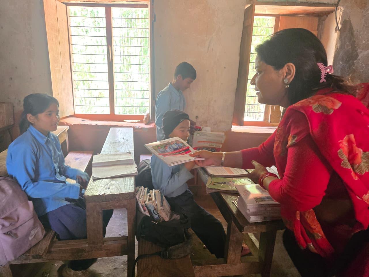 Warm Clothes & Educational Materials Handover